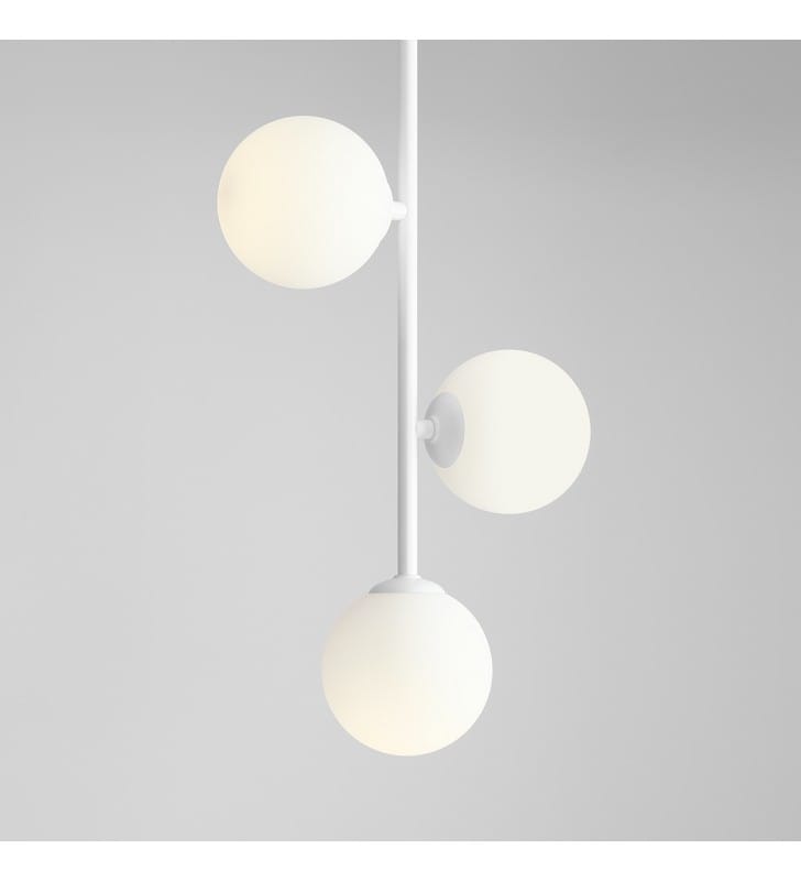 Biała nowoczesna lampa wisząca na sztywnym ramieniu Libra pionowa 3 klosze ze szkła